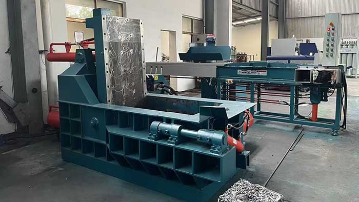 How should you choose the pressure tonnage for a metal baler?